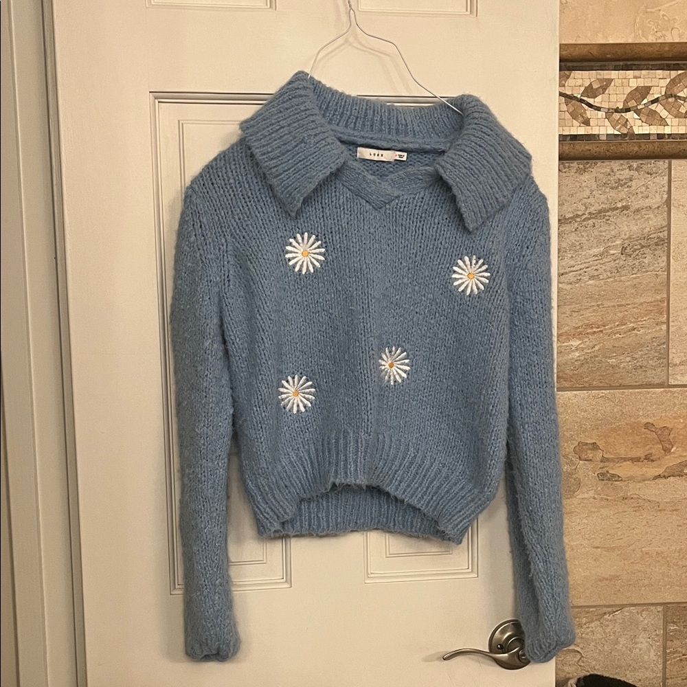 Lush Blue V-Neck Sweater with Floral Accents